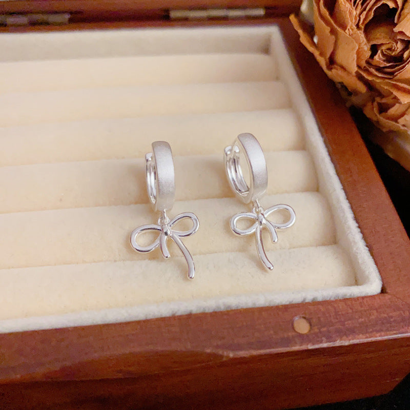 Luxury Brushed Metal Bow Ear Cuff Earrings – Elegant Design