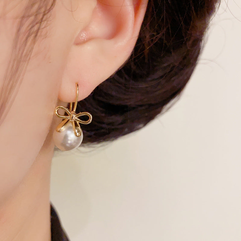 14K Gold Minimalist Metal Bow & Pearl Hook Earrings – Elegant Design