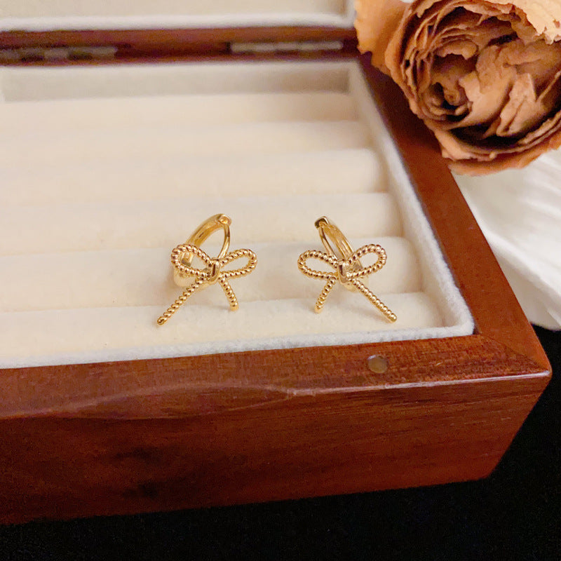 Elegant Metal Bow Small Ear Cuff Earrings – Silver Needle Design