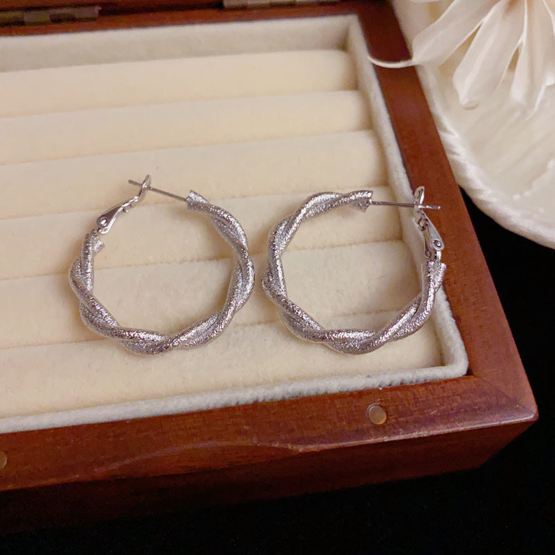 Elegant Sandblasted Twisted Hoop Earrings – Geometric Design