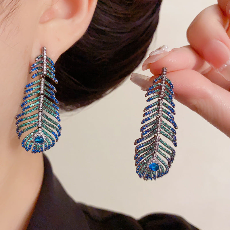 Elegant Peacock Feather Tassel Drop Earrings – Boho Dangle Design