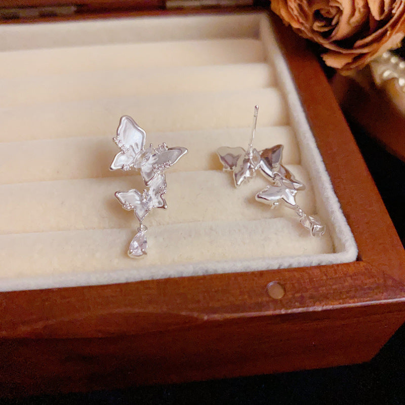 Silver French-Style Zircon Butterfly Tassel Earrings – Elegant Design
