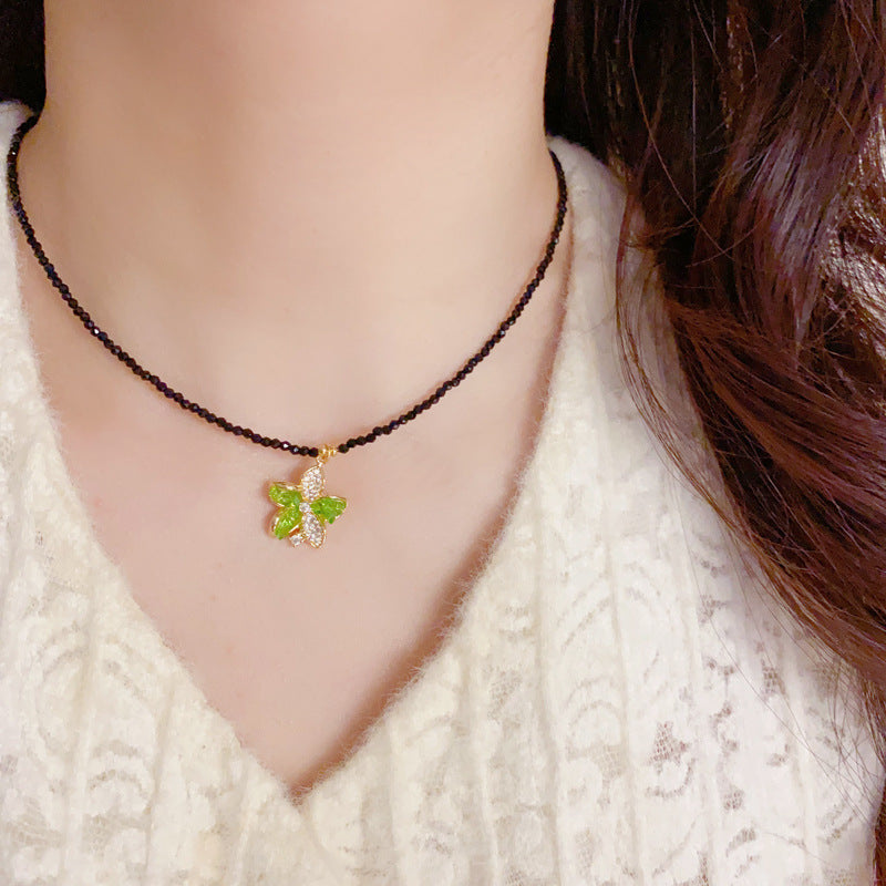 Vintage Green Flower & Black Crystal Pendant Necklace – Elegant Design