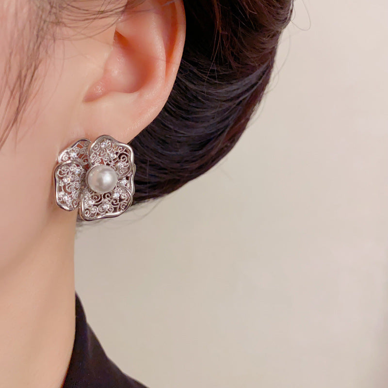 Elegant Hollow Metal Pearl Petal Stud Earrings – Floral Design