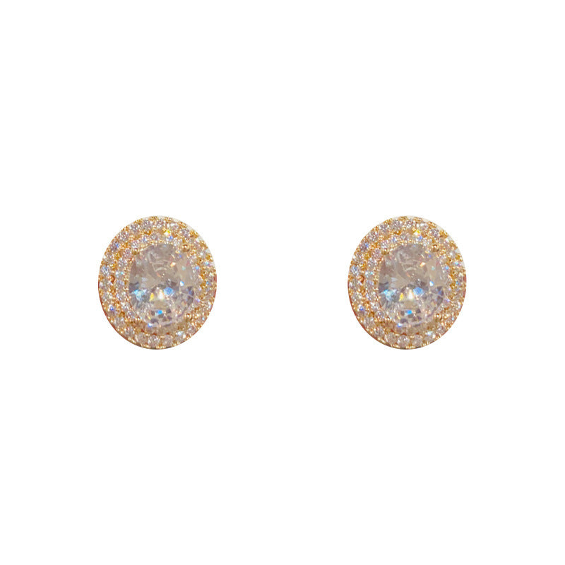 Elegant Zircon Oval Stud Gold Earrings – Geometric Design