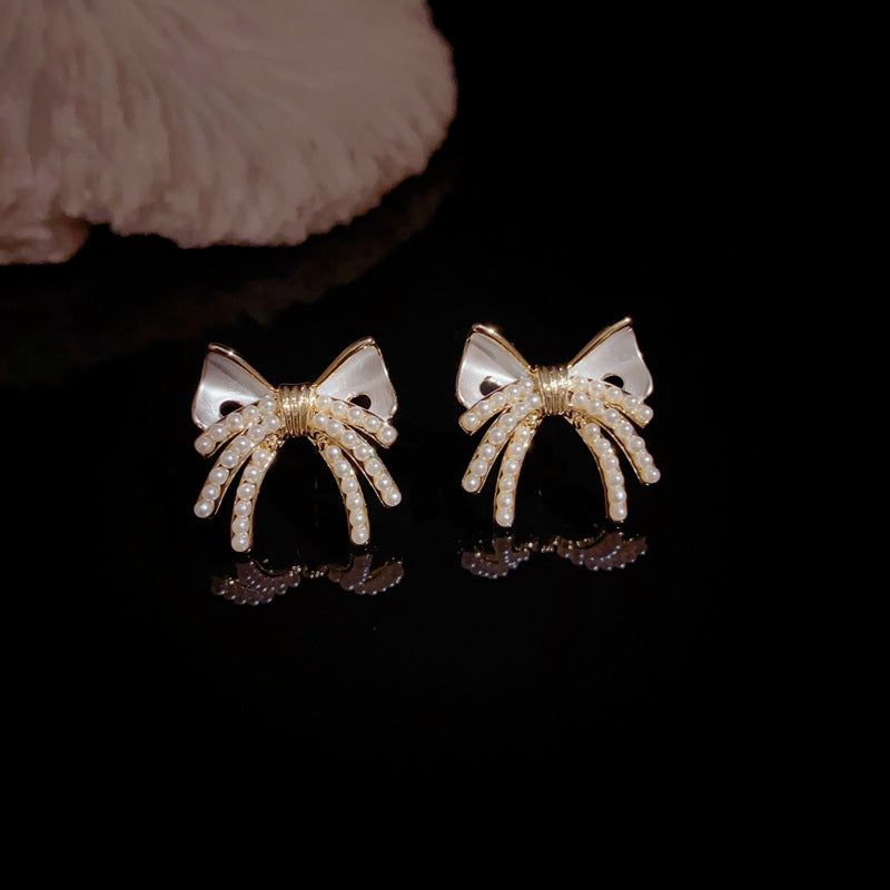 Luxury Pearl & Bow Stud Gold Earrings – Elegant Design