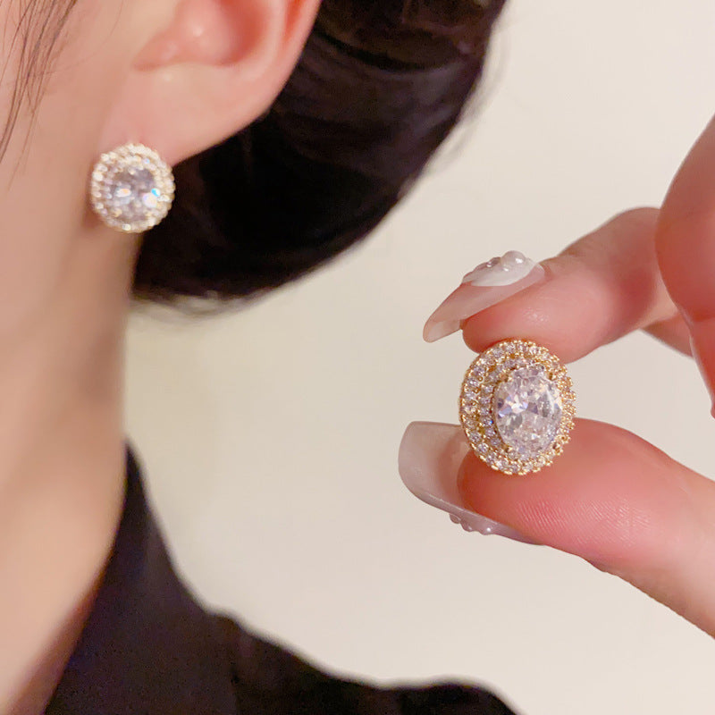 Elegant Zircon Oval Stud Gold Earrings – Geometric Design