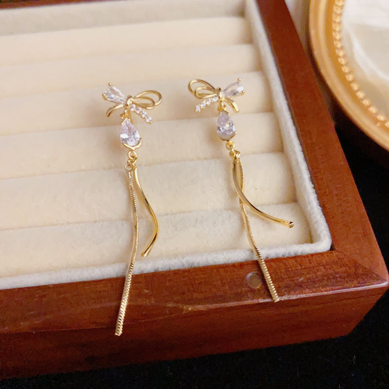 Luxury Zircon Bow & Tassel Drop Earrings – Silver Needle Design