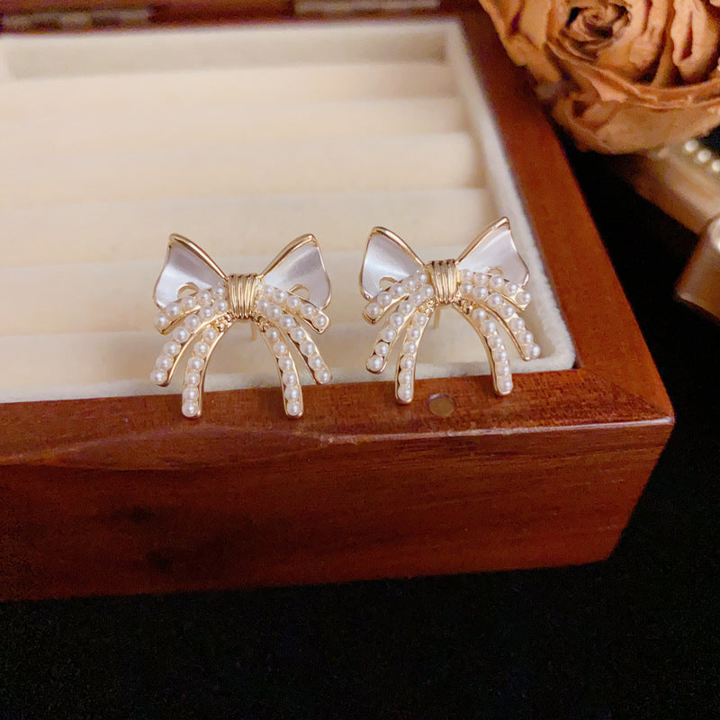 Luxury Pearl & Bow Stud Gold Earrings – Elegant Design