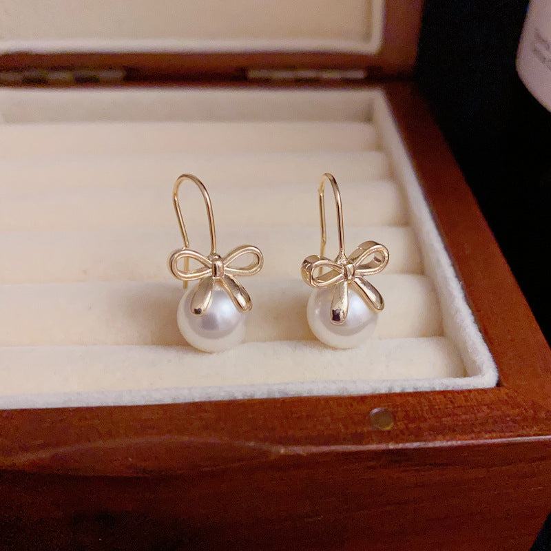 14K Gold Minimalist Metal Bow & Pearl Hook Earrings – Elegant Design