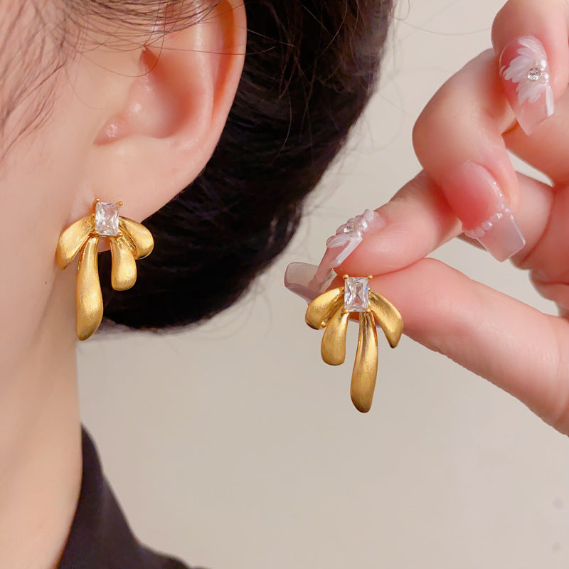 Eaioncol Brushed Metal Bow Stud Earrings Gold Silver