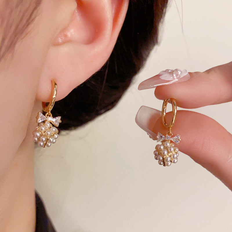 14K Gold Bow Pearl Ball Earrings - Chic Elegance Design