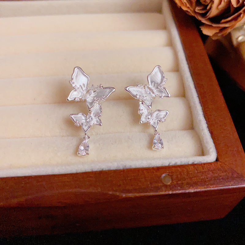 Silver French-Style Zircon Butterfly Tassel Earrings – Elegant Design
