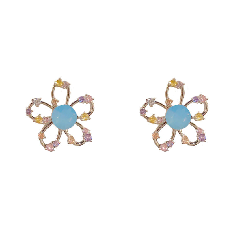 Elegant Rhinestone Hollow Petal Stud Earrings – Floral Design