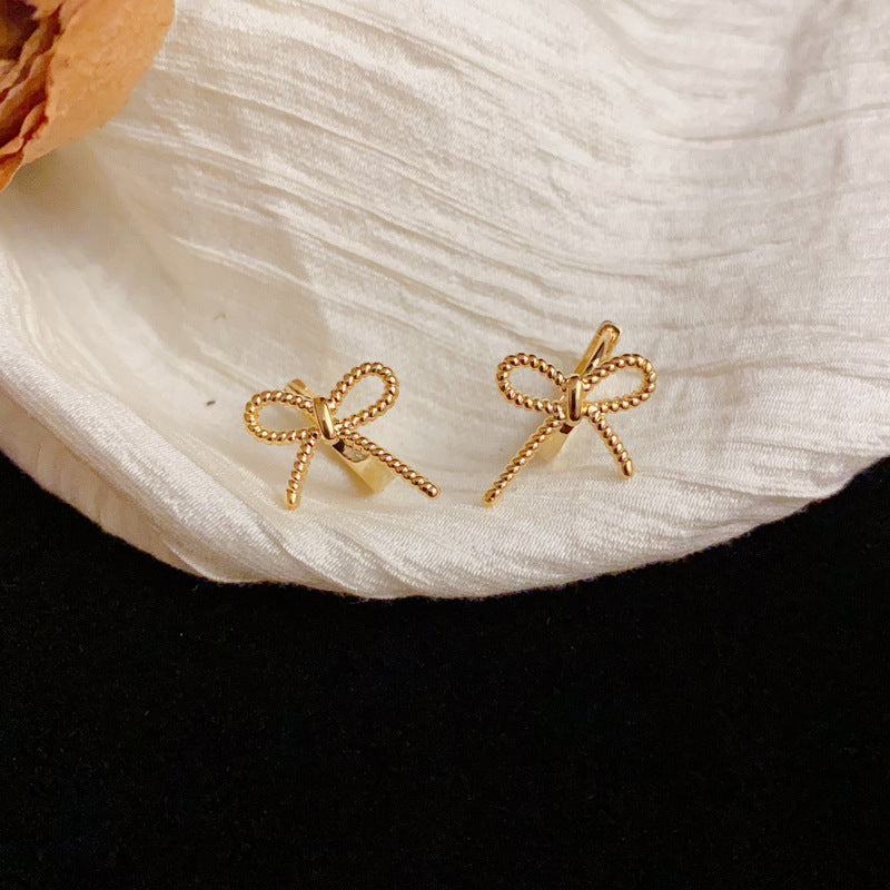 Elegant Metal Bow Small Ear Cuff Earrings – Silver Needle Design