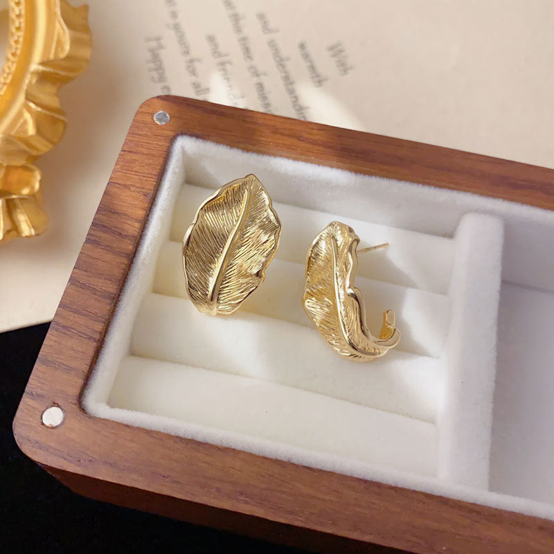 Luxury Textured Metal Leaf Stud Earrings – Elegant Design
