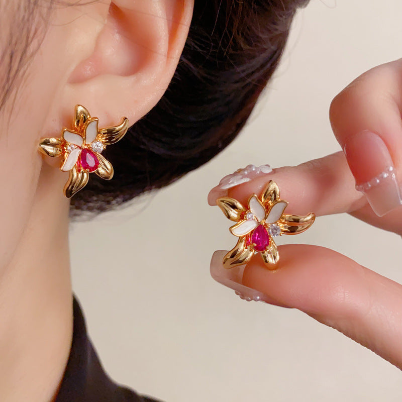 Elegant Zircon Hollow Petal Stud Earrings – Floral Design