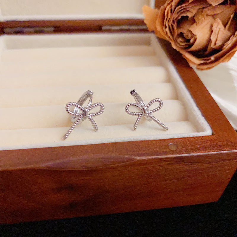 Elegant Metal Bow Small Ear Cuff Earrings – Silver Needle Design