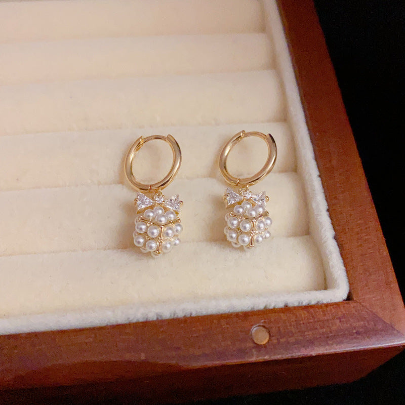 14K Gold Bow Pearl Ball Earrings - Chic Elegance Design