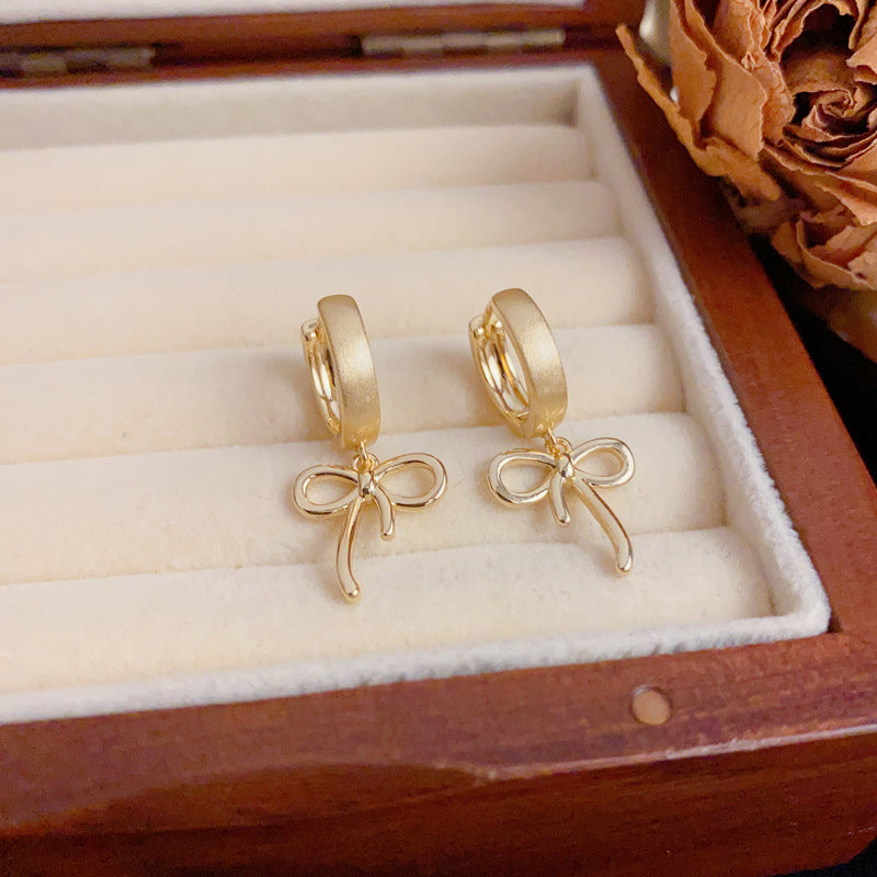 Luxury Brushed Metal Bow Ear Cuff Earrings – Elegant Design