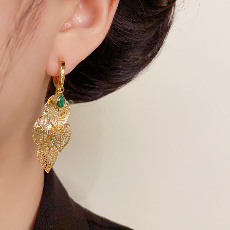 French-Style Hollow Metal Leaf Tassel Earrings – Elegant Floral Design