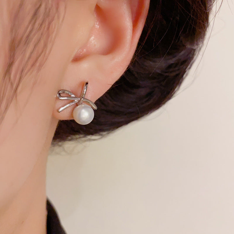 Elegant Bow & Freshwater Pearl Stud Earrings – Silver Needle Design