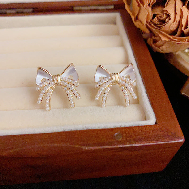 Luxury Pearl & Bow Stud Gold Earrings – Elegant Design