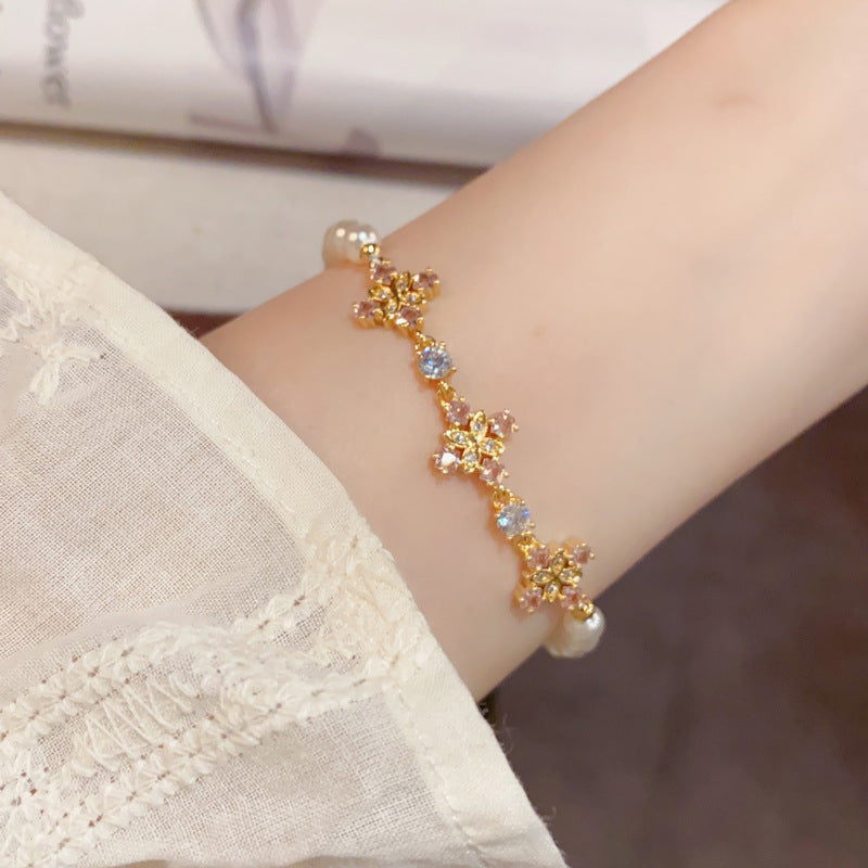 14K Gold Diamond-Inlaid 4-Leaf Flower Pearl Bracelet – Elegant Design