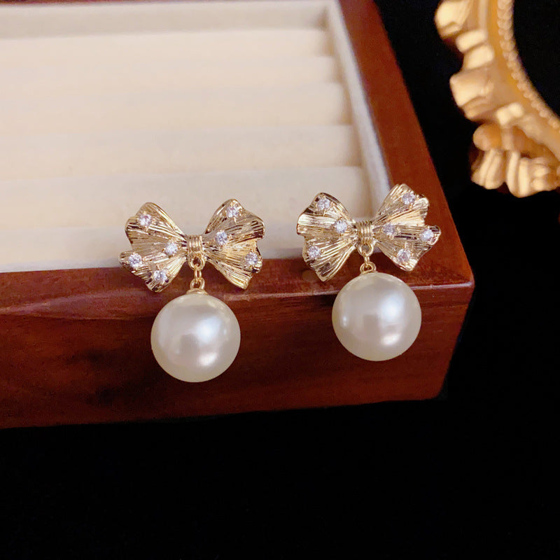 Luxury Zircon Metal Bow & Pearl Earrings – Elegant Design