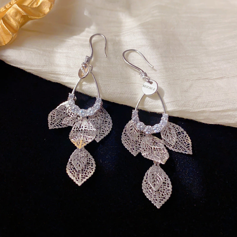 Luxury Zircon Metal Hollow Leaf Tassel Earrings – Elegant Design
