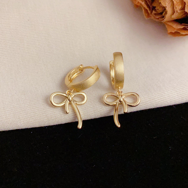 Luxury Brushed Metal Bow Ear Cuff Earrings – Elegant Design