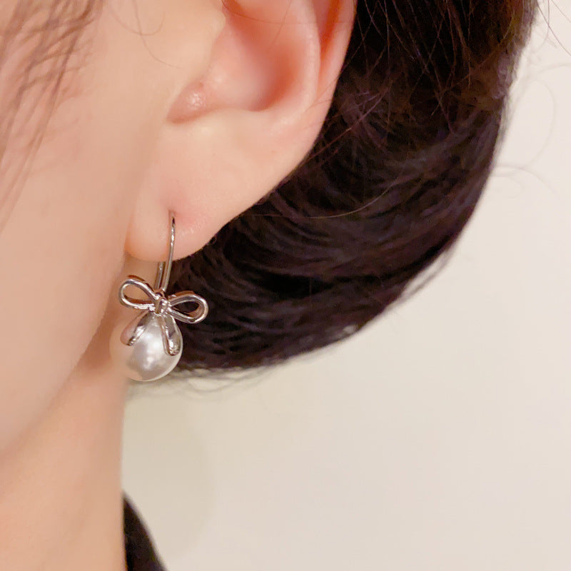 14K Gold Minimalist Metal Bow & Pearl Hook Earrings – Elegant Design