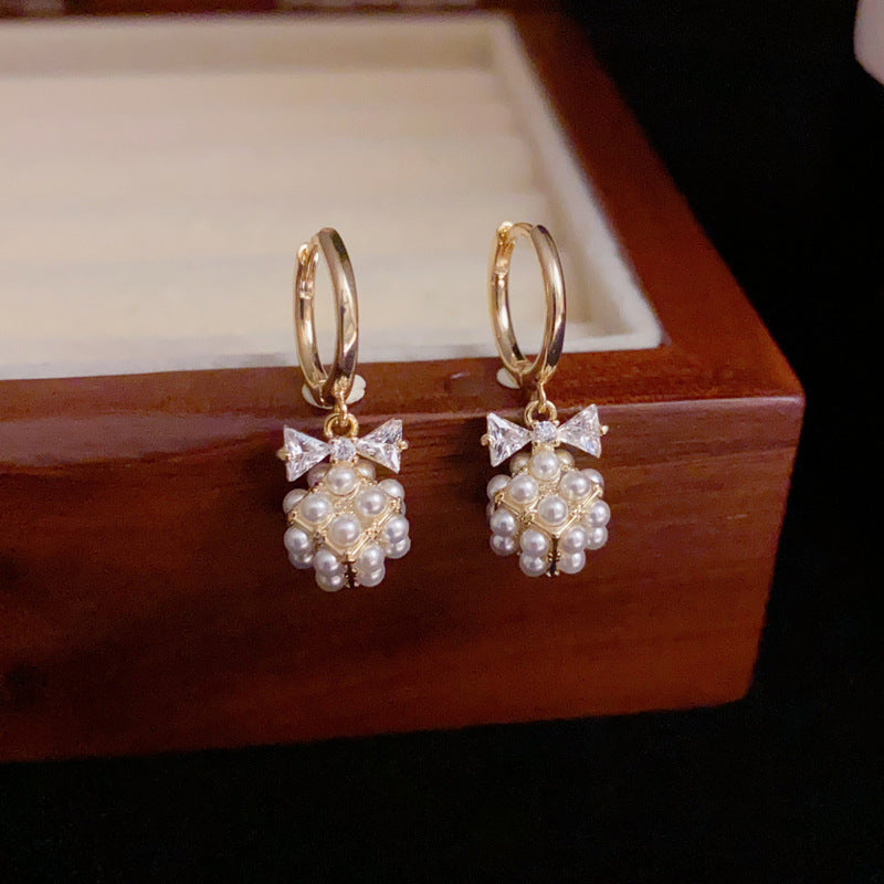 14K Gold Bow Pearl Ball Earrings - Chic Elegance Design