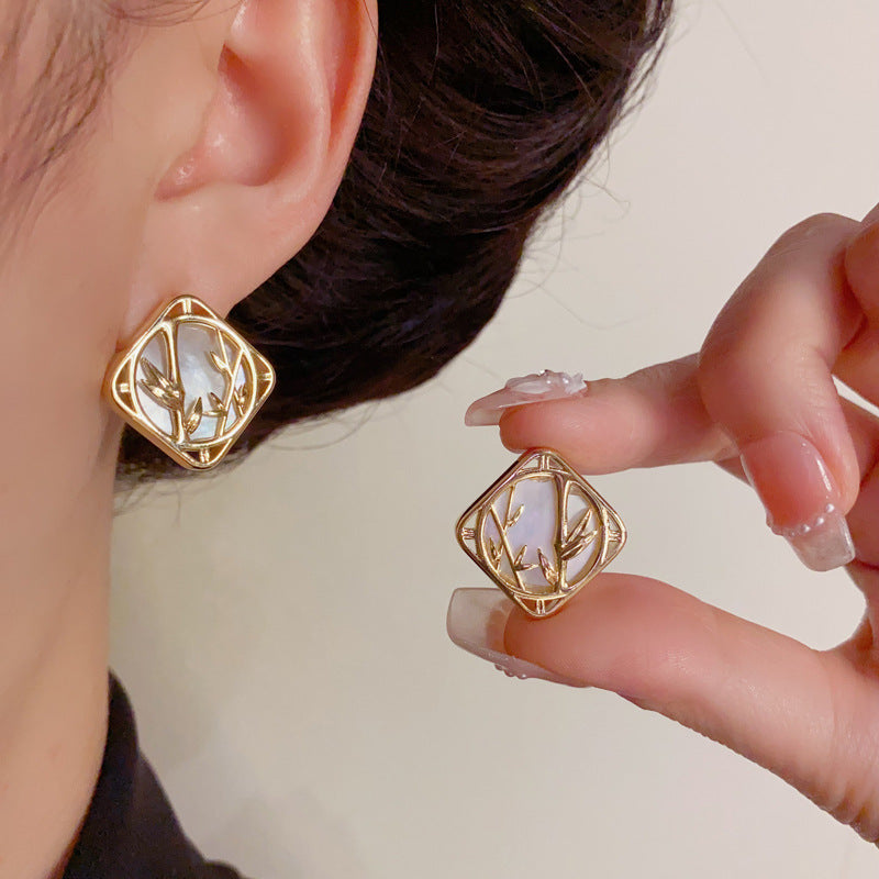 Luxury Shell Bamboo Leaf Stud Gold Earrings – Elegant Floral Design
