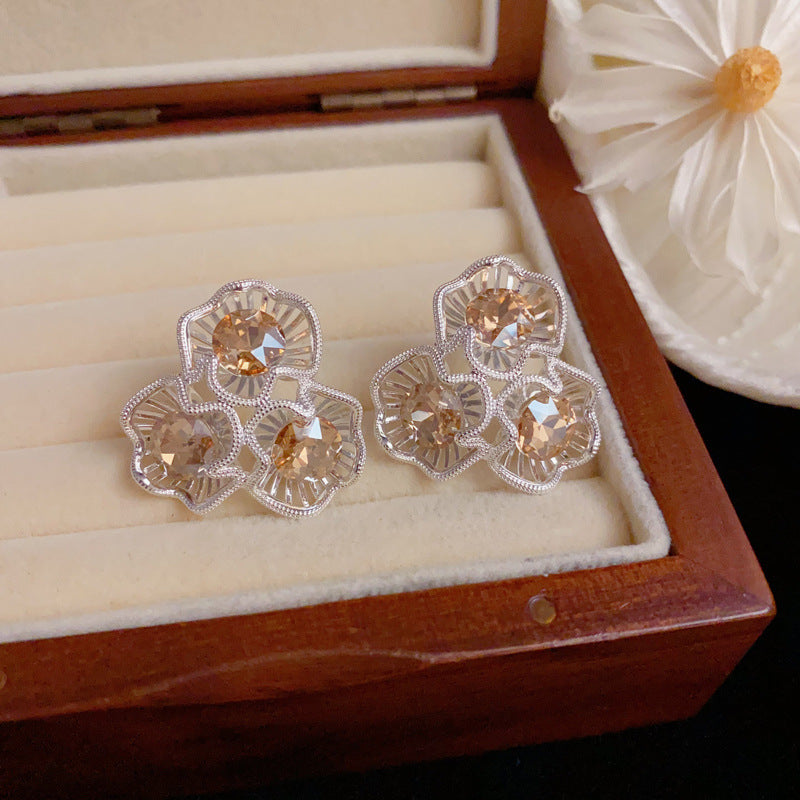 Elegant Silver Openwork Crystal Petal Earrings – Floral Design