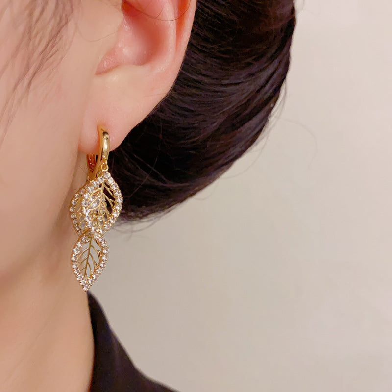Elegant Zircon Hollow Leaf Tassel Earrings – French Botanical Design