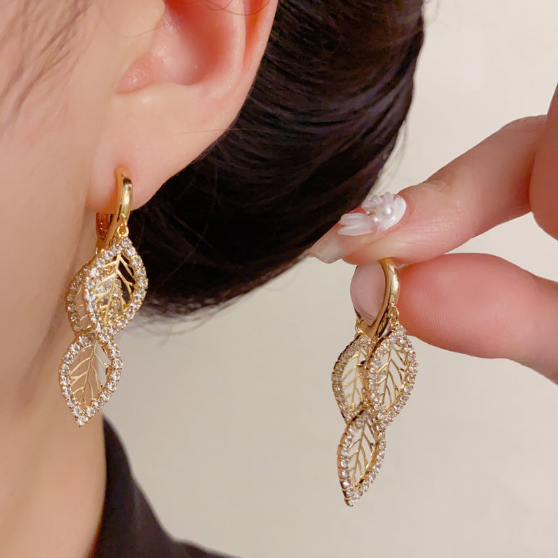 Elegant Zircon Hollow Leaf Tassel Earrings – French Botanical Design