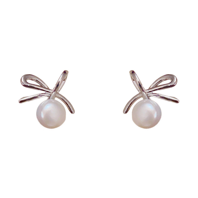 Elegant Bow & Freshwater Pearl Stud Earrings – Silver Needle Design