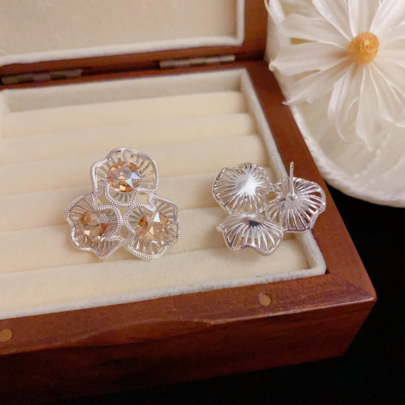 Elegant Silver Openwork Crystal Petal Earrings – Floral Design
