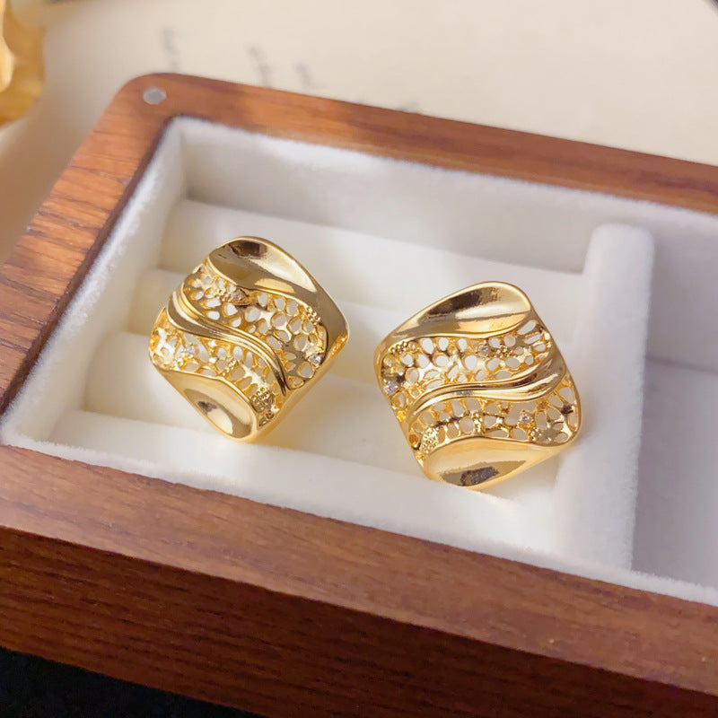 Luxury Hollow Diamond-Shaped Metal Stud Earrings – Geometric Design