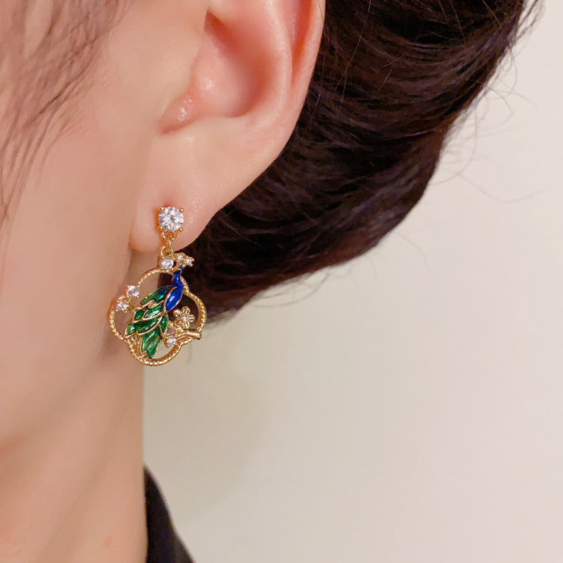 Elegant Petal Peacock Drop Gold Earrings – Floral Design