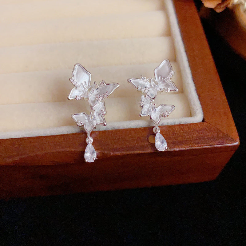 Silver French-Style Zircon Butterfly Tassel Earrings – Elegant Design
