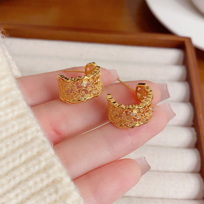 Elegant Irregular Hollow Metal C-Hoop Earrings – French Retro Design
