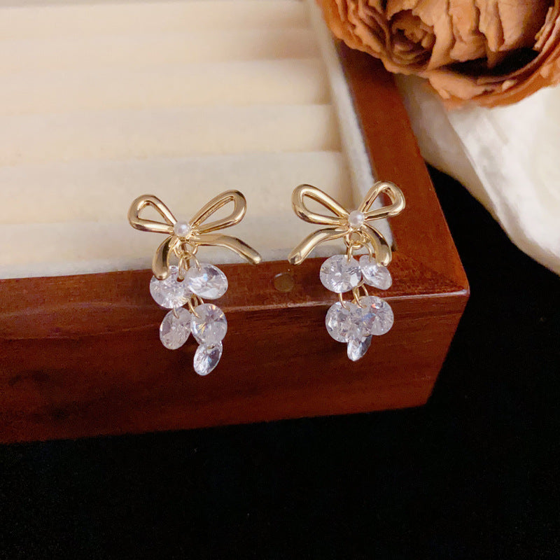 Luxury Metal Bow & Crystal Grape Drop Earrings – Elegant Design