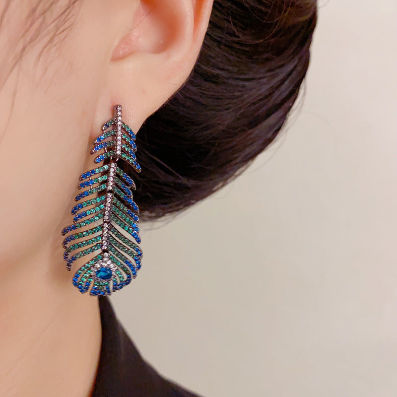 Elegant Peacock Feather Tassel Drop Earrings – Boho Dangle Design