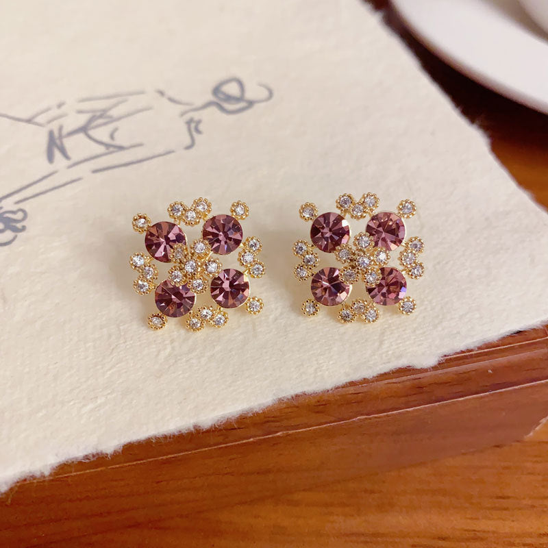 Elegant Full-Zircon Purple Hollow Petal Stud Earrings – Floral Design