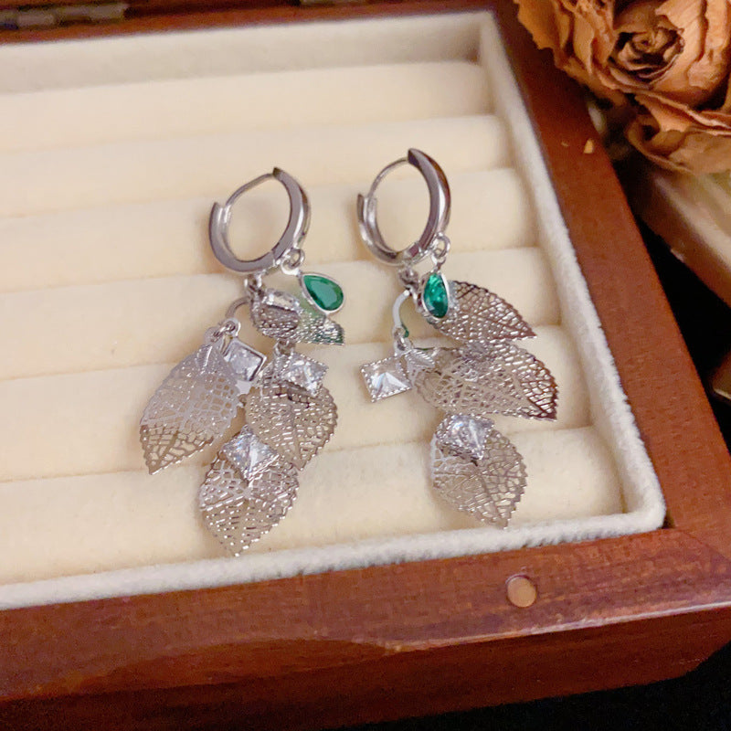 French-Style Hollow Metal Leaf Tassel Earrings – Elegant Floral Design