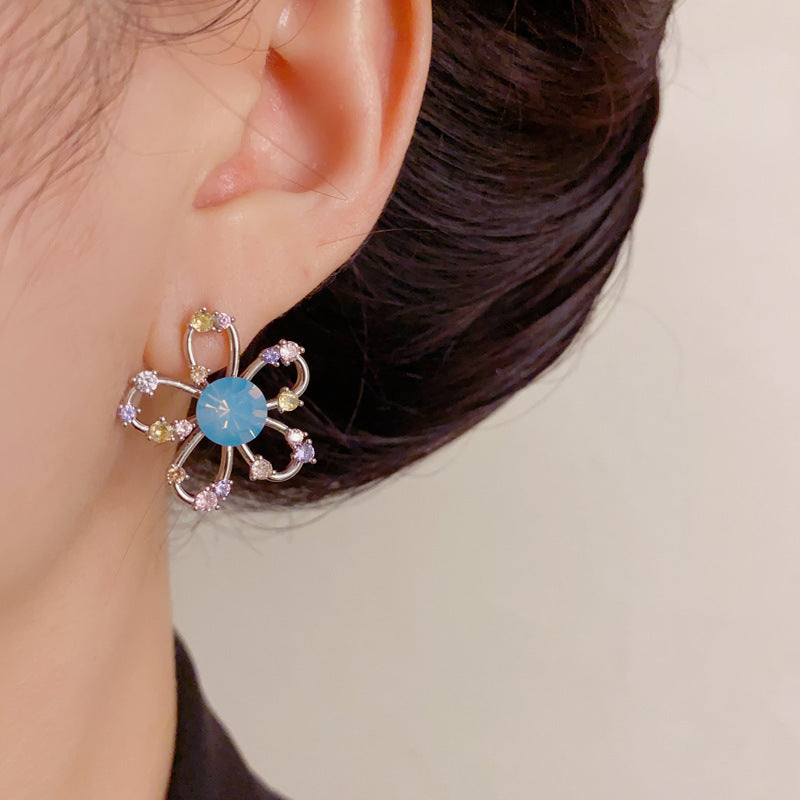 Elegant Rhinestone Hollow Petal Stud Earrings – Floral Design
