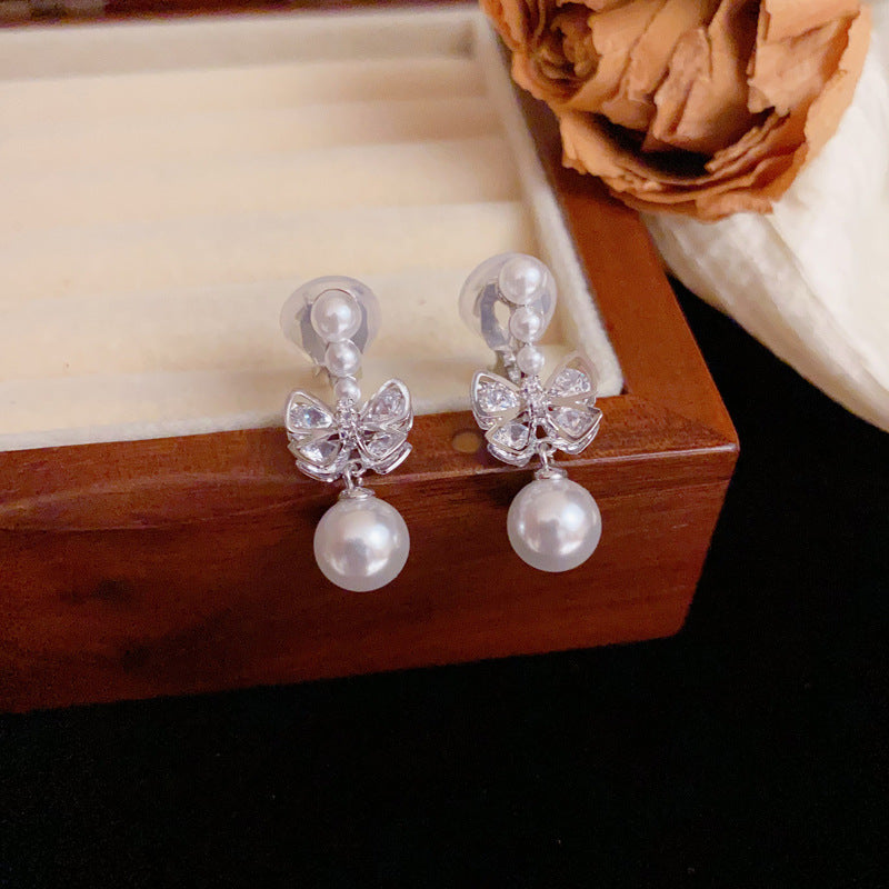 Luxury Bow & Pearl Ear Clip Earrings – No Piercing Elegant Design
