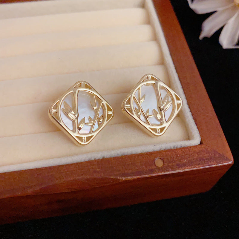 Luxury Shell Bamboo Leaf Stud Gold Earrings – Elegant Floral Design